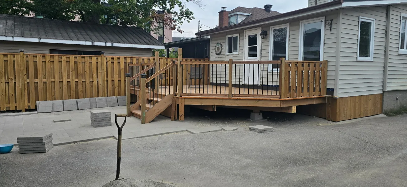 Finished deck with steps and railing built by JD Flooring in North Bay