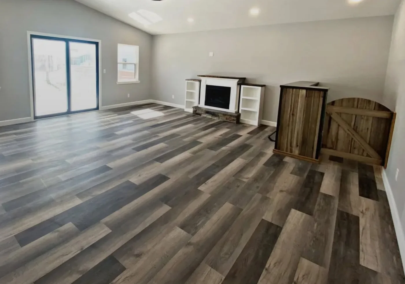 Finished luxury vinyl plank living room floor installed by JD Flooring in North Bay