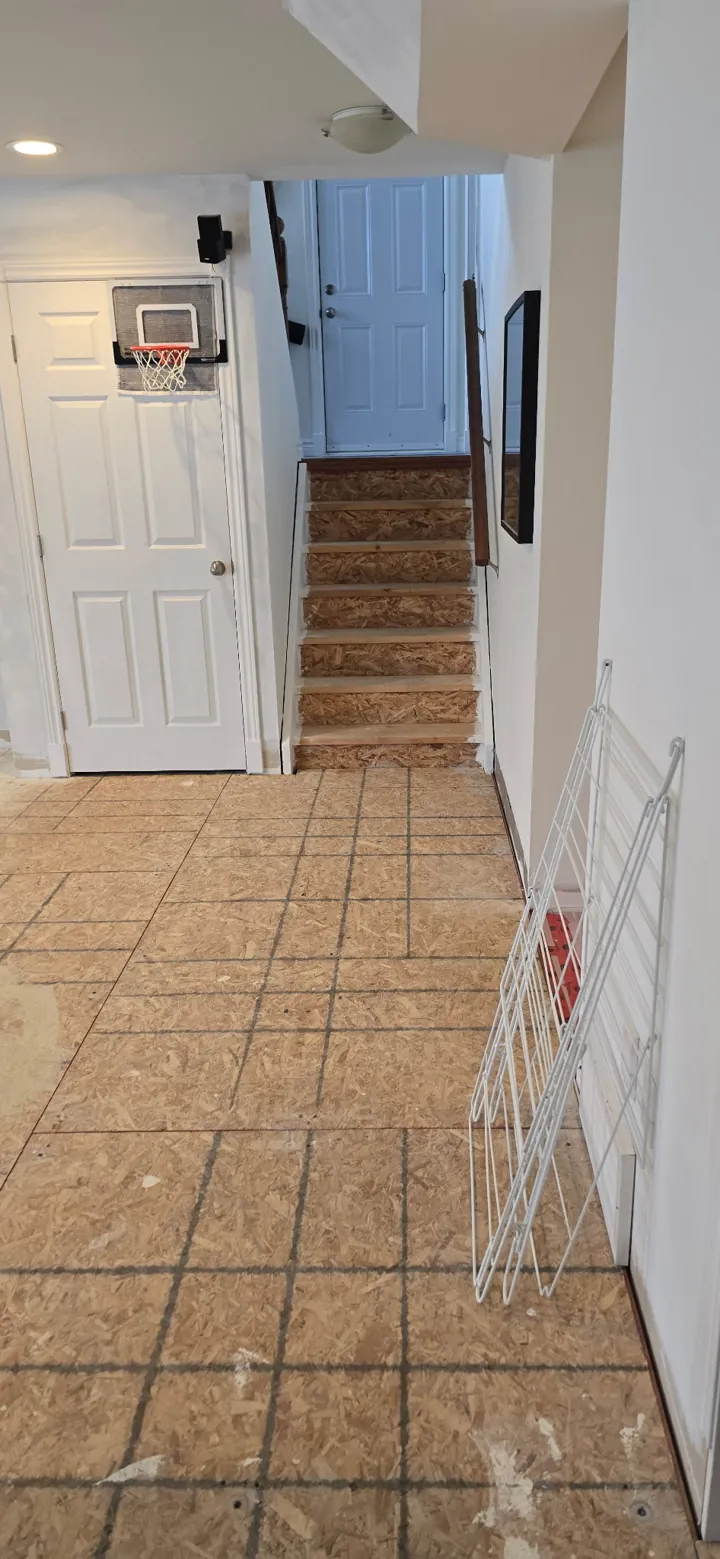 Finished basement flooring by JD Flooring
