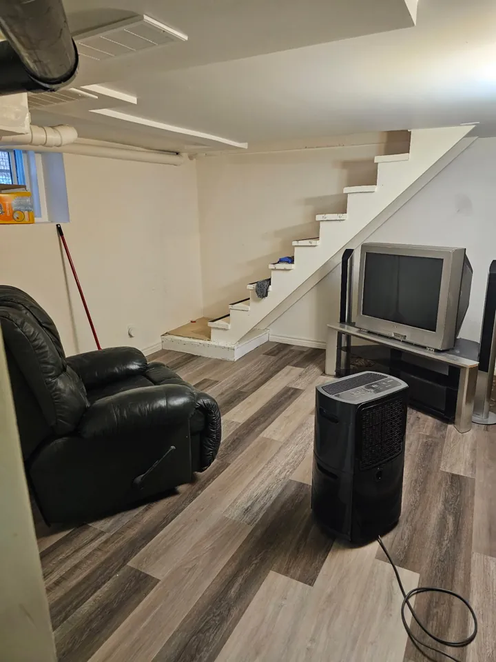 Finished basement flooring by JD Flooring