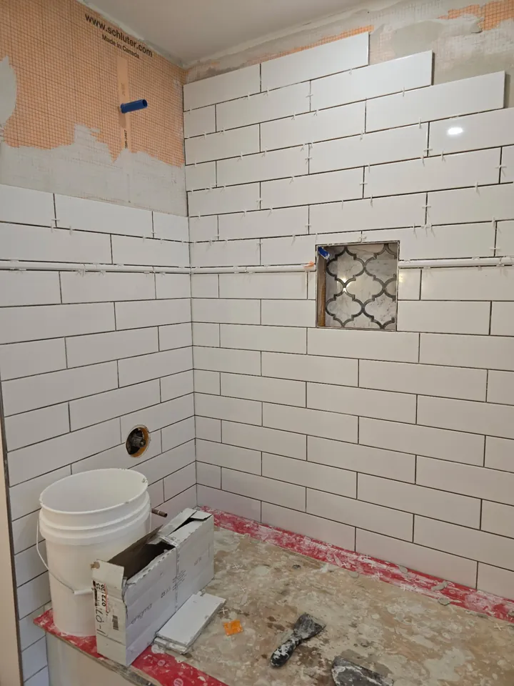 Tiled bathroom installed by JD Flooring