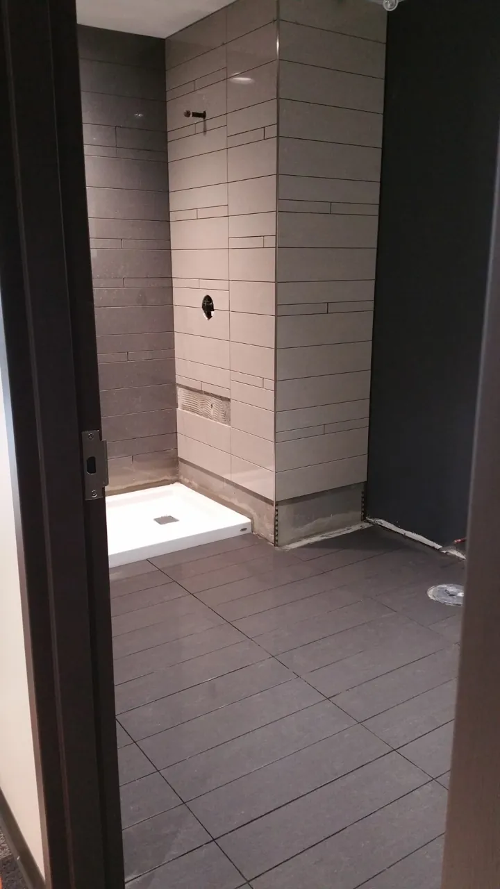 Tiled bathroom installed by JD Flooring