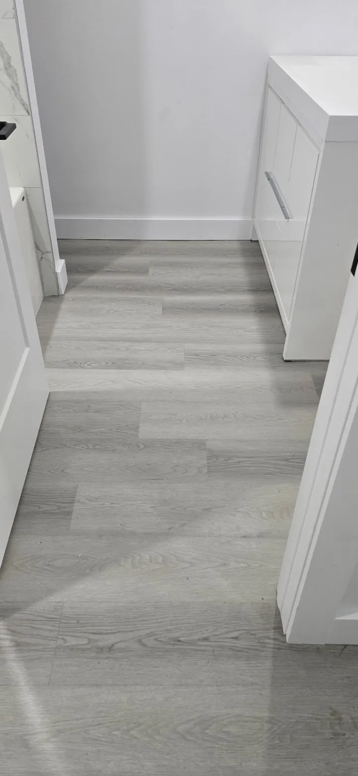 Tiled bathroom installed by JD Flooring