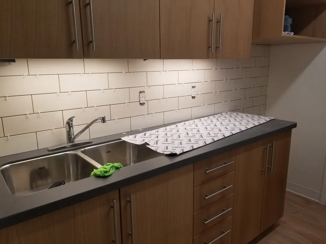 Kitchen subway tile backsplash installed by JD Flooring
