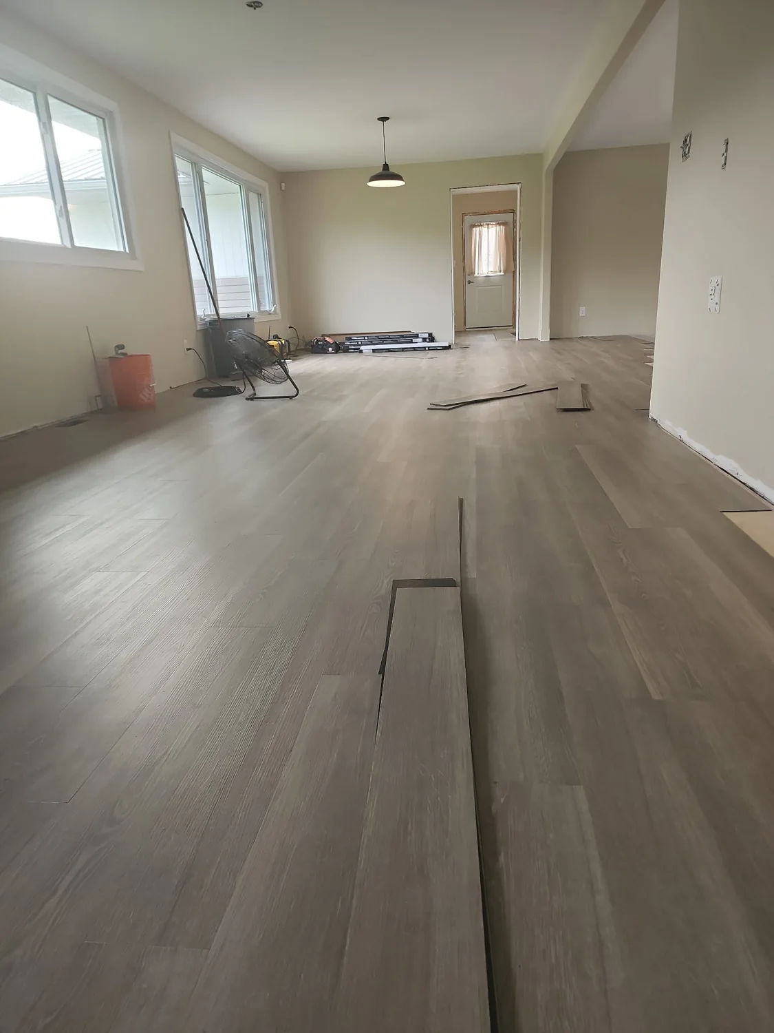 Laminate flooring in a bright North Bay room installed by JD Flooring