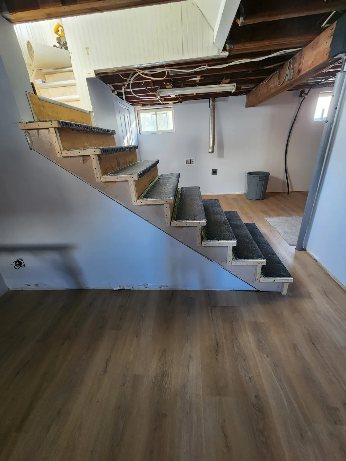 Wood staircase installed by JD Flooring in North Bay